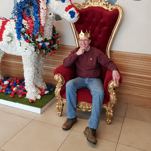 why is breakfast important picture of me sitting on a throne with a crown next to a paper mache horse.