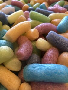it's not easy being green. picture of multi-coloured corn starch packing peanuts