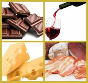 Picture of wine, chocolate. swiss cheese and cured meats like bacon and salami. All of which contain amines that you may be intolerant to which affects your gut health.